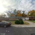 Person yelling and banging on windows at residence