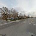 Driver flashing lights in smoky gray Ford hatchback