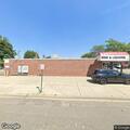 Male bleeding outside liquor store on North Broadway