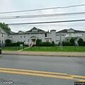 Person experiencing rib pain at Alexandria Manor