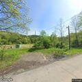 Tree on power lines causing smoke on Chambersville Rd