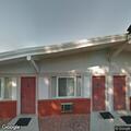 Woman reports being hit with can at motel room