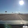 Obstructed license plate on black SUV