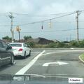 Disabled SUV with broken axle on highway
