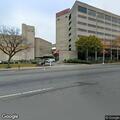 Person experiencing chest pain at doctor's office