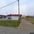 Person slumped over wheel in car at Leon store