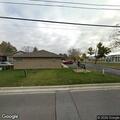 Man with possible broken foot at medical center lobby