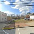Flagpole fire reported on North Main Street