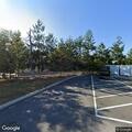 Female possibly intoxicated and lying on bench at highway