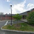Person hit in face by golf ball at golf course clubhouse
