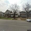 Person banging on back door on East Main Street