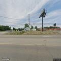 Tree stump fire in front of school on Park Avenue