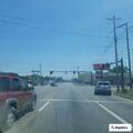 Officer checking for erratic white Honda on Elida Road