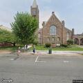 Woman needing assistance in front of Patchogue church