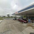 Person unresponsive at gas station air pump