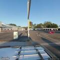 Man walking in and out of street causing traffic hazard