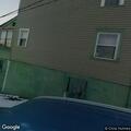 Woman passed out but breathing at business rear