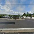Disabled vehicle near gas station on Bull Avenue