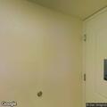 Person experiencing leg pain at NYIT dormitory