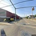 Car strikes fence, driver trapped in vehicle