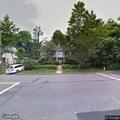 Tree and power line down blocking roadway