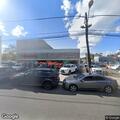 Person looking into vehicles at car dealership