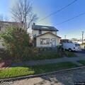 Garage fire with flames through roof in Canton