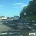 Car leaking fuel on Long Island Expressway