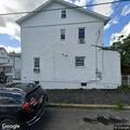 Person with abdominal pain near Spruce Street in Kulpmont