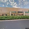 Car and bicycle crash in fitness center parking lot