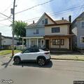 Loose utility wire reported on Clay Street