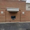 Pedestrian pinned under car near Capital One bank
