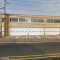 Unconscious man found lying on grass at fire department