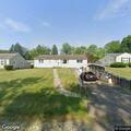 Detached carport fire at Ambrose Avenue home