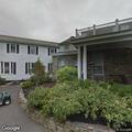 Person with breathing difficulty at country club parking lot