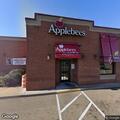 Person showing stroke symptoms outside Applebee's