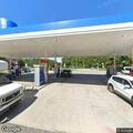 Person locked in vehicle with cardiac device at gas station