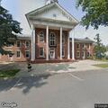 Woman punched outside courthouse