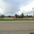 Person lying in parking lot at Circle K in Dunlap