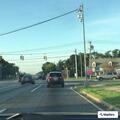 Suspicious gray vehicle circling parking lot