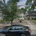 Car hits parked vehicle and ends up on lawn