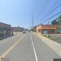 Person vomiting in locker room at Glen Head post office