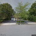 Two men arguing at Downey Drive residence