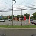 Intoxicated man damaging vehicle at fast food lot