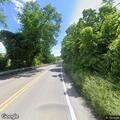 Car hits guardrail, driver briefly unresponsive
