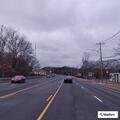 Road hazard with open manholes near McDonald’s