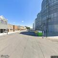 Person slumped at wheel of van on South Front Street