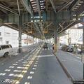 Disorderly man holding gate open and panhandling