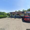 Officer assists with belongings at Selden store