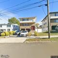 Person staring at houses on Richmond Street